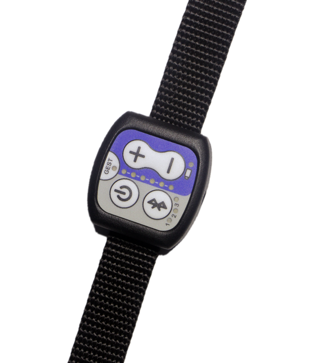 Black Kinemo controller with a purple display on a white background